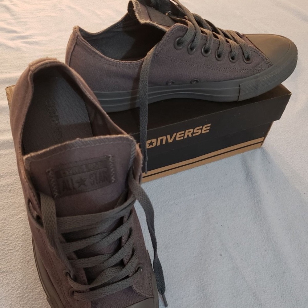 Grey Converse unisex low tops.